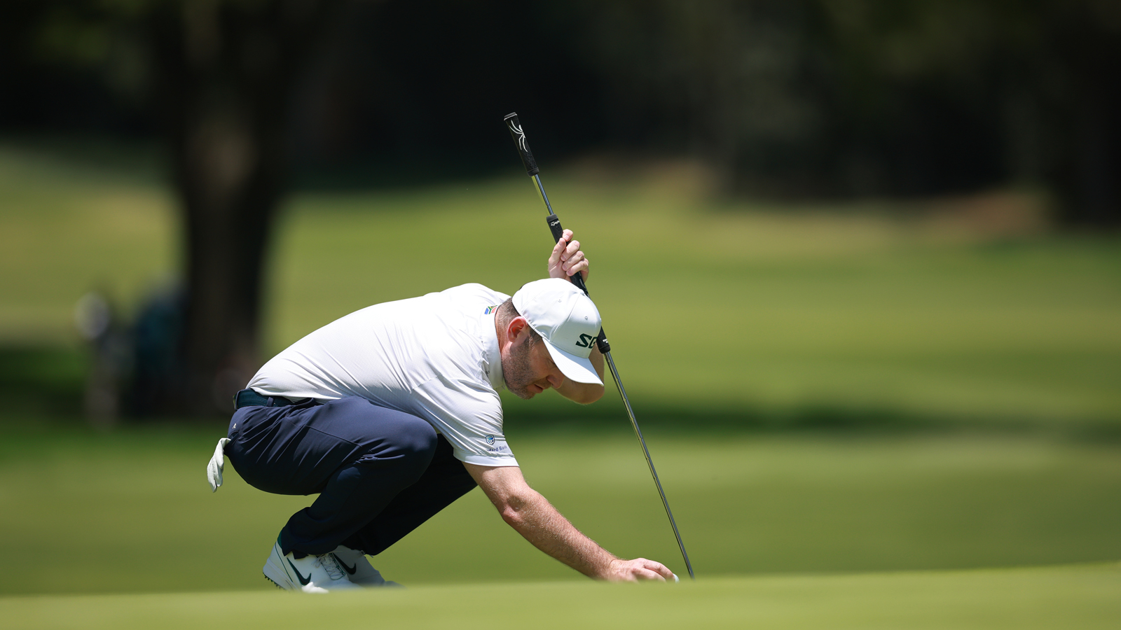 Branden Grace lines up a putt
