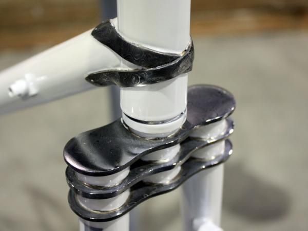 Villin builder Alexis Dold uses unique-looking damascus steel on many of his frames.