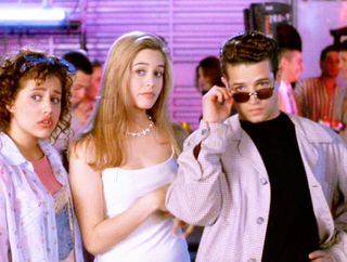 Brittany Murphy (as Tai), Alicia Silverstone (as Cher Horowitz) and Justin Walker (as Christian) in Clueless. Here Cher is wearing her white Calvin Klein dress