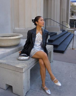 jeannine.roxas styles silver flats with a silver mini dress and blazer.