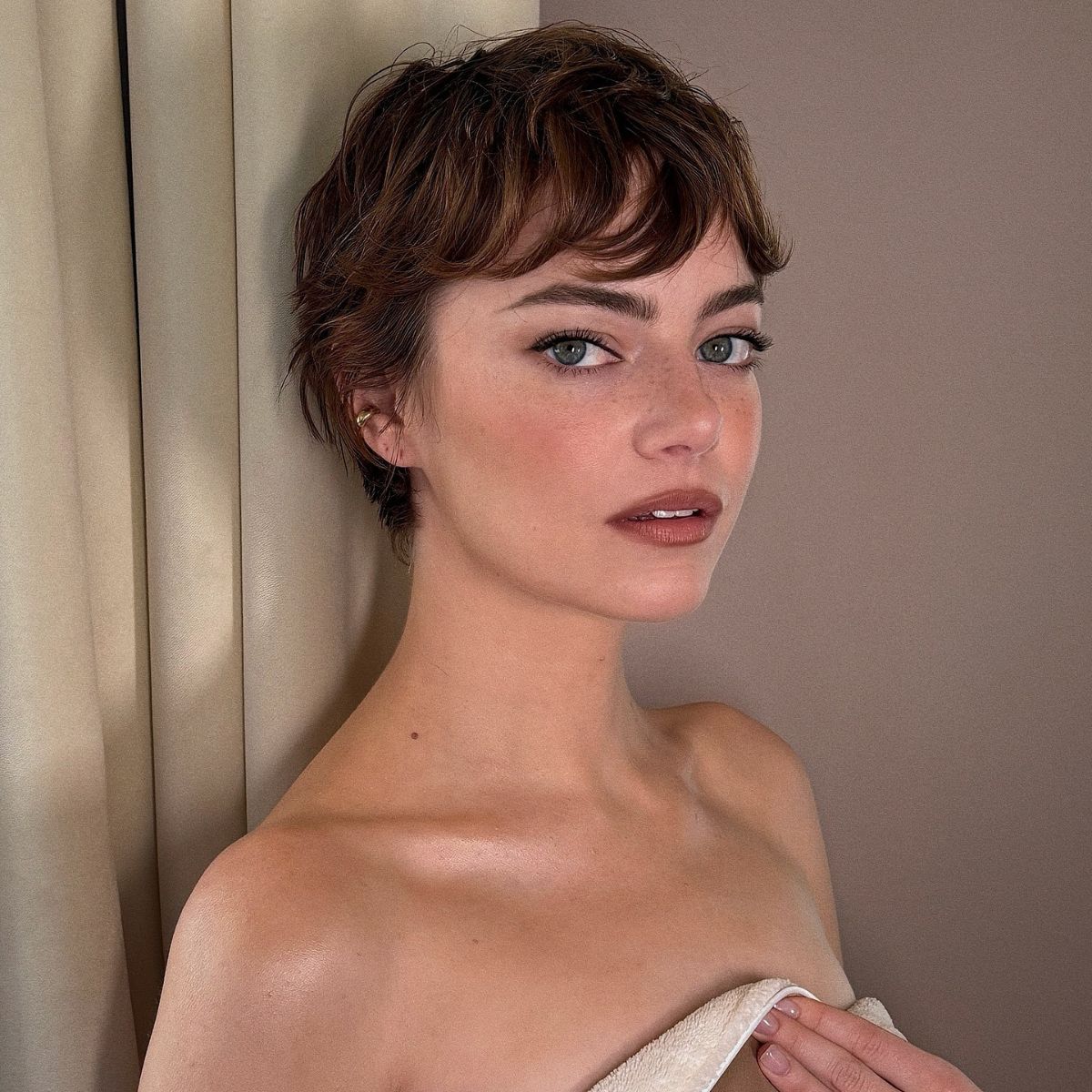 Emma Stone with a long pixie hairstyle