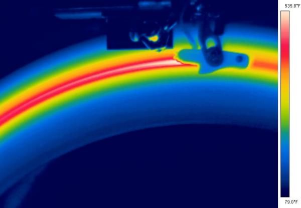 Zipp says this infrared image shows the superior heat capacity and dissipation capabilities of its new 404 Carbon Clincher rim. Even so, we experienced faster-than-anticipated heat build-up on our test set during long descents and panic stops plus ear-piercing brake howling once things got hot.