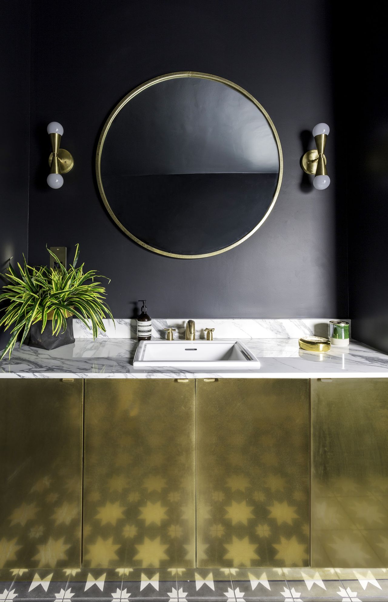 Bathroom decorating ideas with gold vanity unit matching gold mirror