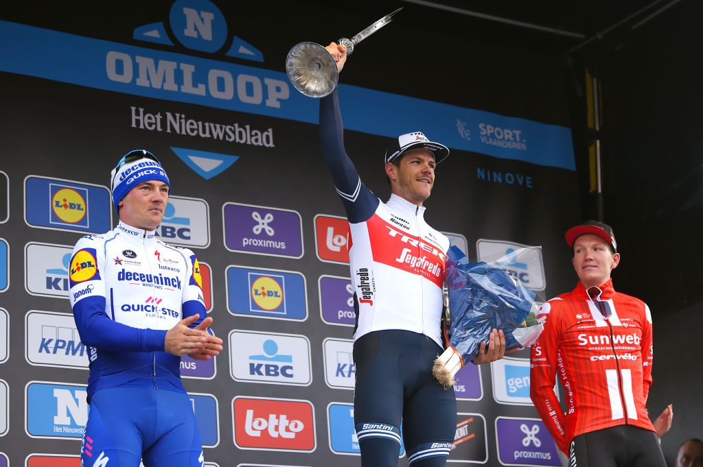 NINOVE BELGIUM FEBRUARY 29 Podium Yves Lampaert of Belgium and Team Deceuninck QuickStep Jasper Stuyven of Belgium and Team Trek Segafredo Sren Kragh Andersen of Denmark and Team Sunweb Celebration Trophy during the 75th Omloop Het Nieuwsblad 2020 Men Race a 200km race from Ghent to Ninove OmloopHNB OHN20 on February 29 2020 in Ninove Belgium Photo by Luc ClaessenGetty Images