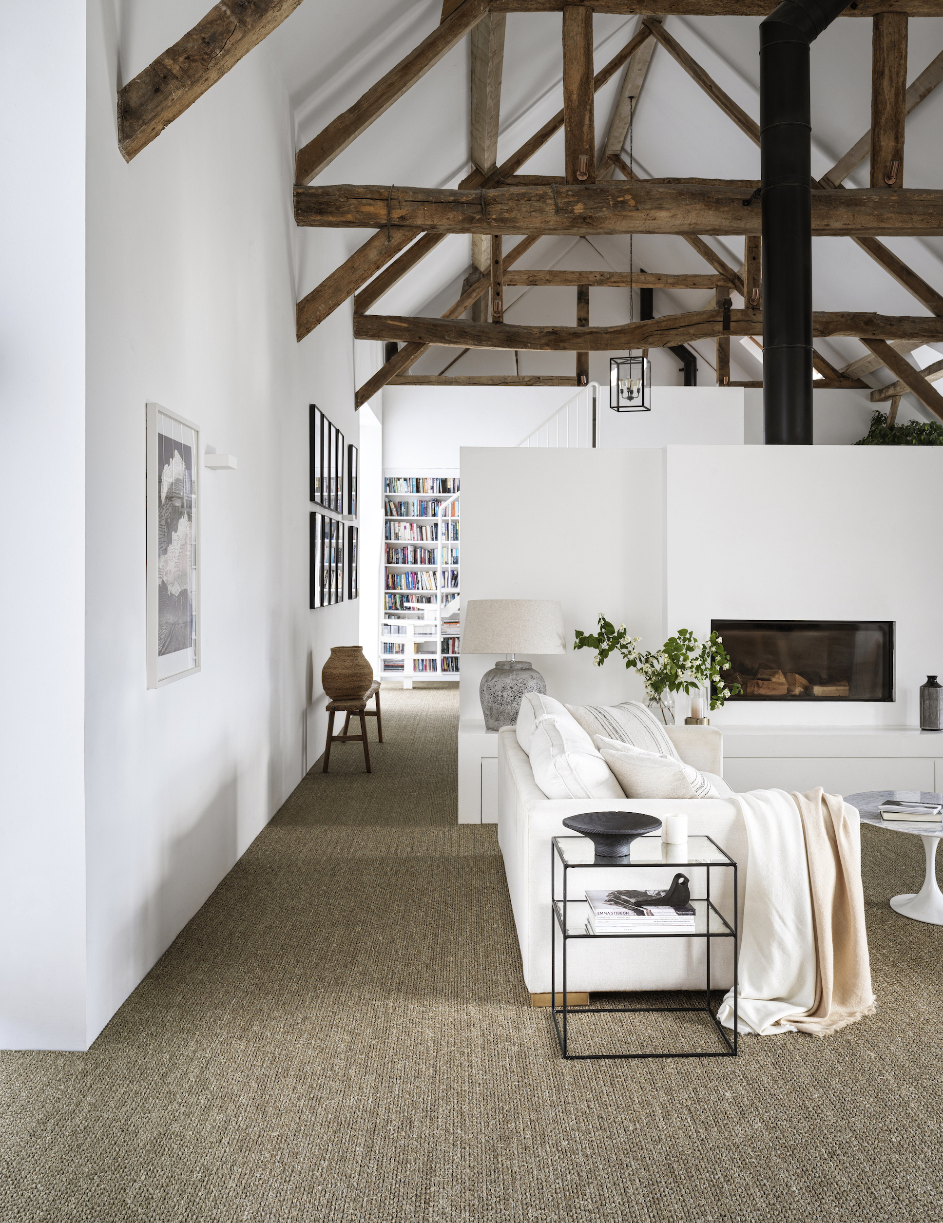 Rustic living room with fitted sisal carpet