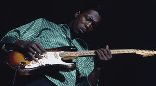 Buddy Guy performs live at the American Folk Blues Festival tour in London in October 1965.