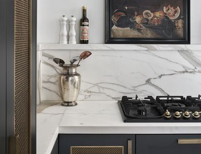 relaxing kitchen with with white countertop and vintage art print