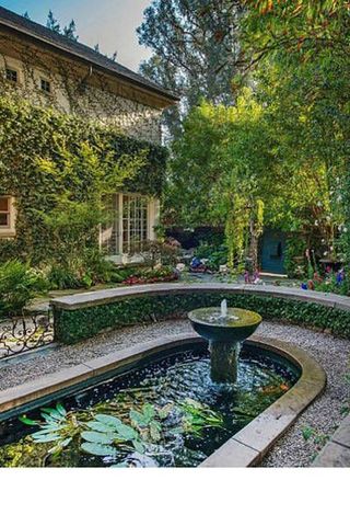 Plant, Garden, Water feature, Shrub, Landscaping, Yard, Courtyard, Cobblestone, Fountain, Hedge,