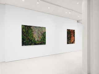 White gallery with pictures on the walls
