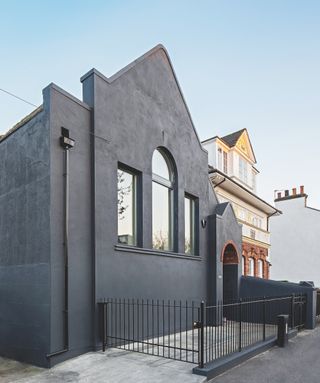 black rendered chapel conversion exterior