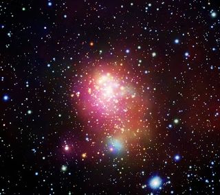 An image of a glowing red area in a field of stars