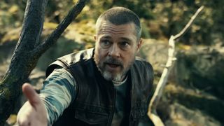 James Belmont (Brad Pitt) reaches out his hand in Heart of the Beast.