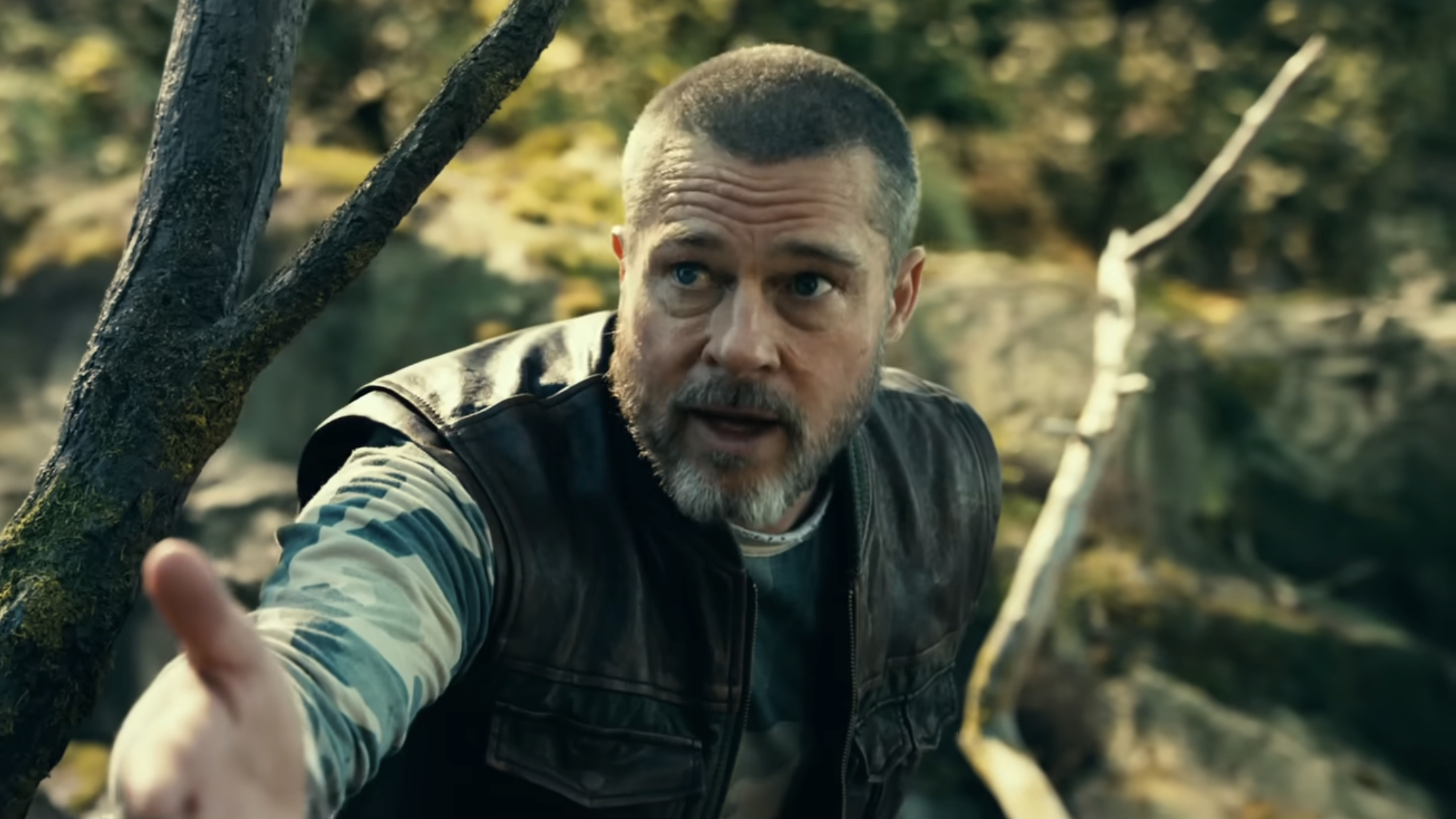 James Belmont (Brad Pitt) reaches out his hand in Heart of the Beast.