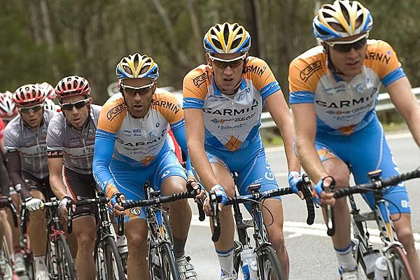 Riders from Garmin/Slipstream and Fly V Australia drive the chasing pack towards Stuart Shaw.