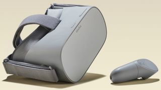 Oculus Go headset and controller resting next to each other