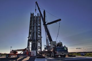 The LADEE spacecraft in the nose-cone at the top of the full Minotaur V launch vehicle stack. LADEE is the first spacecraft designed, developed, built, integrated and tested at NASA's Ames Research Center in Moffett Field, Calif.