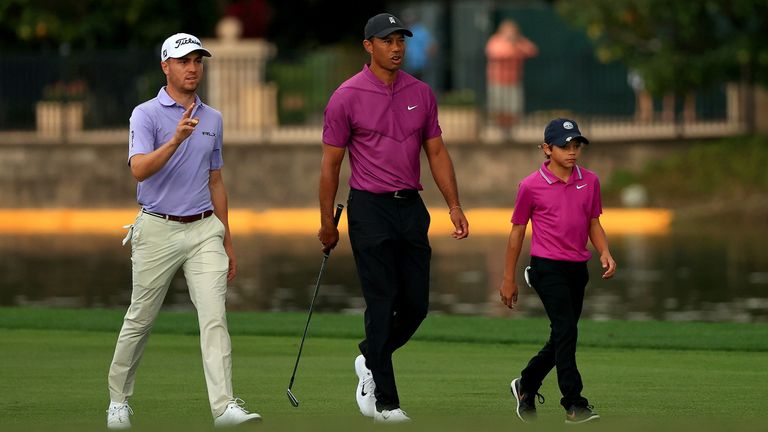 Tiger Woods, now the most backed player to win the 2022 Masters, enjoys a practice round with son Charlie and close friend Justin Thomas