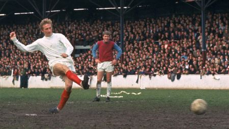 Denis Law taking a penalty for Manchester United during a match against West Ham United at Upton Park in London