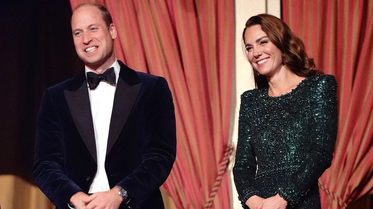 Prince William, Duke of Cambridge (L) and Britain's Catherine, Duchess of Cambridge (R) smile after watching the Royal Variety Performance