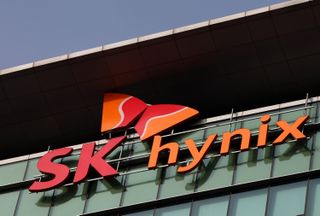 The SK Hynix Semiconductor Inc. logo is displayed at the company's plant during a media tour organized by Korea Industrial Complex Corp. (KICOX) in Cheongju, South Korea, on Friday, Nov. 23, 2012. KICOX, which develops and manages industrial complexes and support for resident enterprises as a public company under South Korea's Ministry of Knowledge Economy, held a media tour to the plant