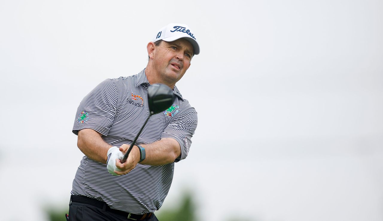 Chalmers watches his tee shot after striking a fairway wood