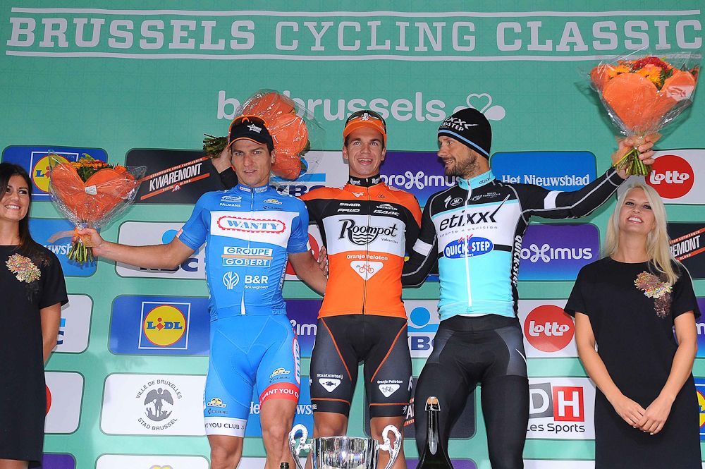 Roy Jans, Dylan Groenewegen and Tom Boonen on the Brussels podium.