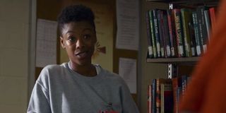 Poussey in the library