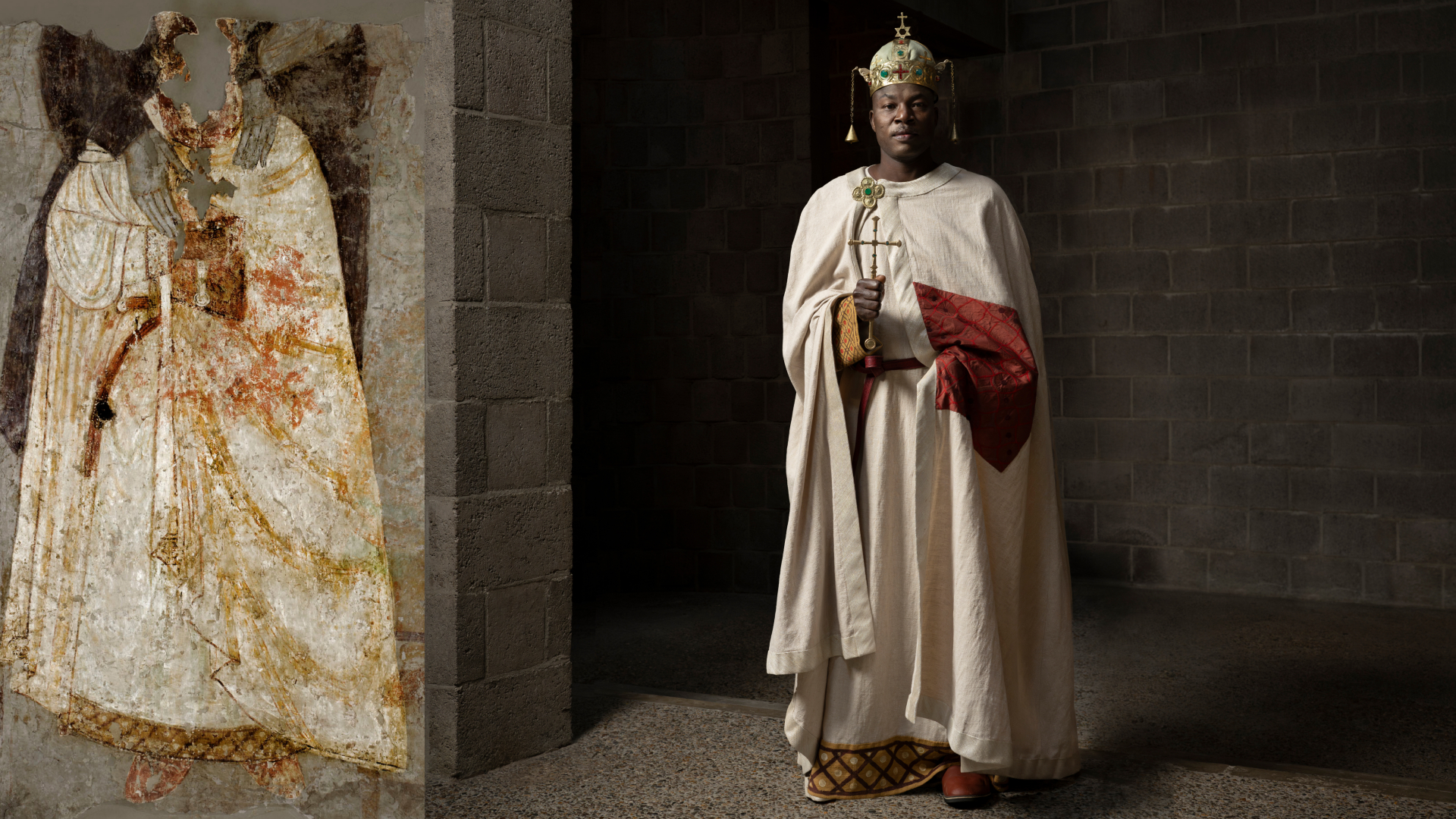 A model wears colorful patterned clothing with an ancient painting cutout next to the model for comparison