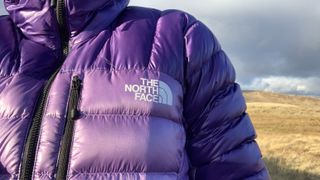 Julia Clarke wearing The North Face Summit Breithorn Down Jacket