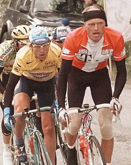 Bjarne Riis (Telekom) leads Berzin during a short but heroic defence of the yellow jersey in 1996