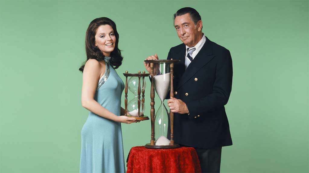 DAYS OF OUR LIVES -- Season 8 -- Pictured: (l-r) Susan Seaforth Hayes as Julie Anderson, Macdonald Carey as Tom Horton -- (Photo by: Herb Ball/NBCU Photo Bank/NBCUniversal via Getty Images via Getty Images)
