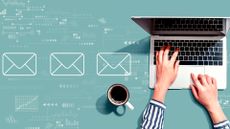 Person at laptop with a coffee with animations of envelopes on the background