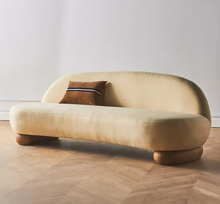 Neutral curved sofa