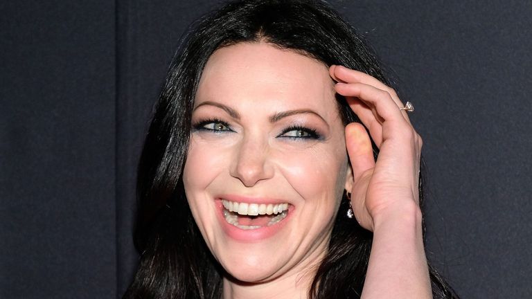Laura Prepon with a huge smile.