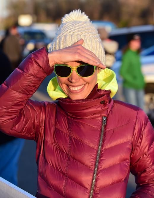 Emily Kachoric cheering for her teammate Anthony Clark (Squid Bikes)