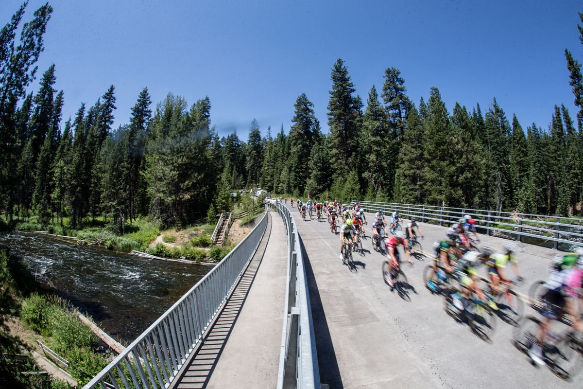Riders pass a bridge along todays route