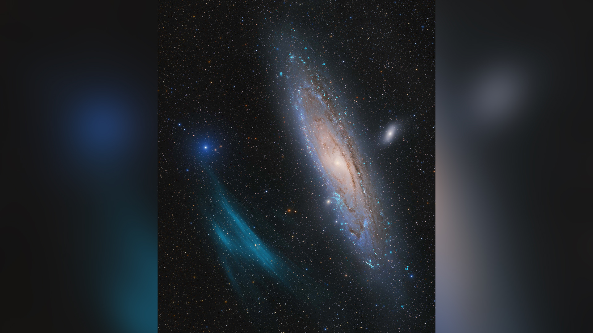 Photo of Andromeda galaxy, large, blue plasma arc.