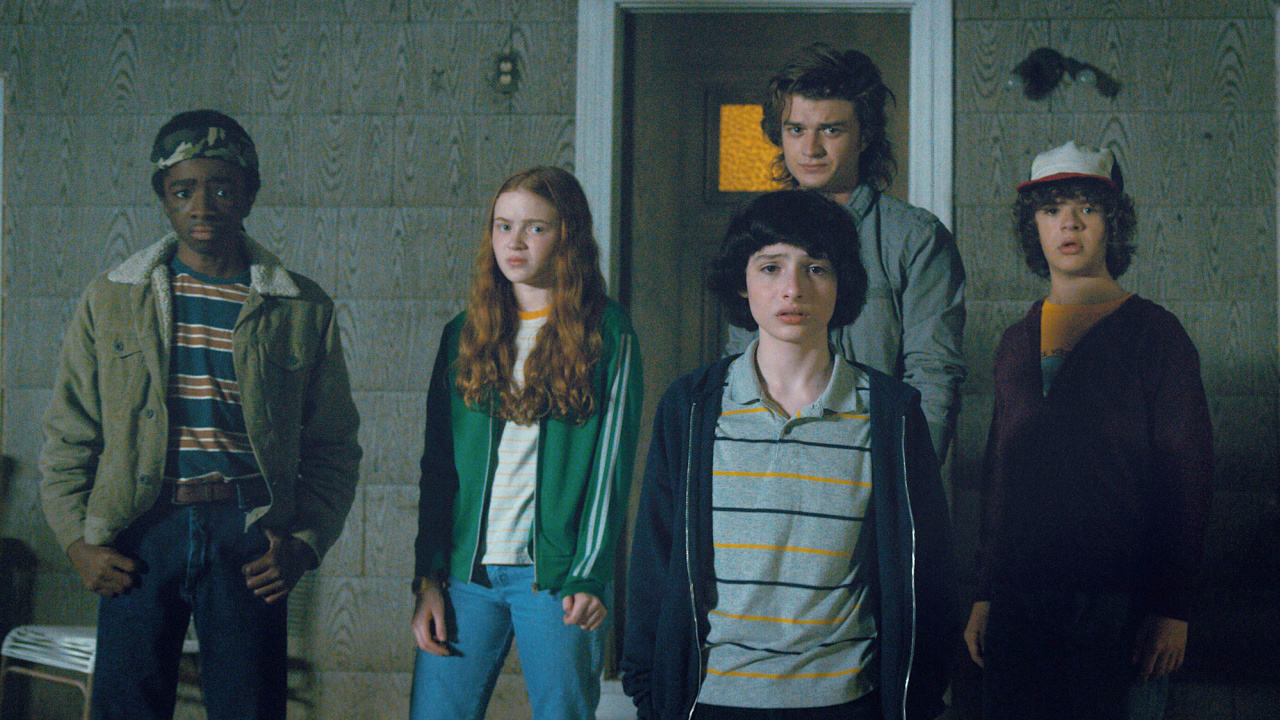 Steve with the main gang in Stranger Things.