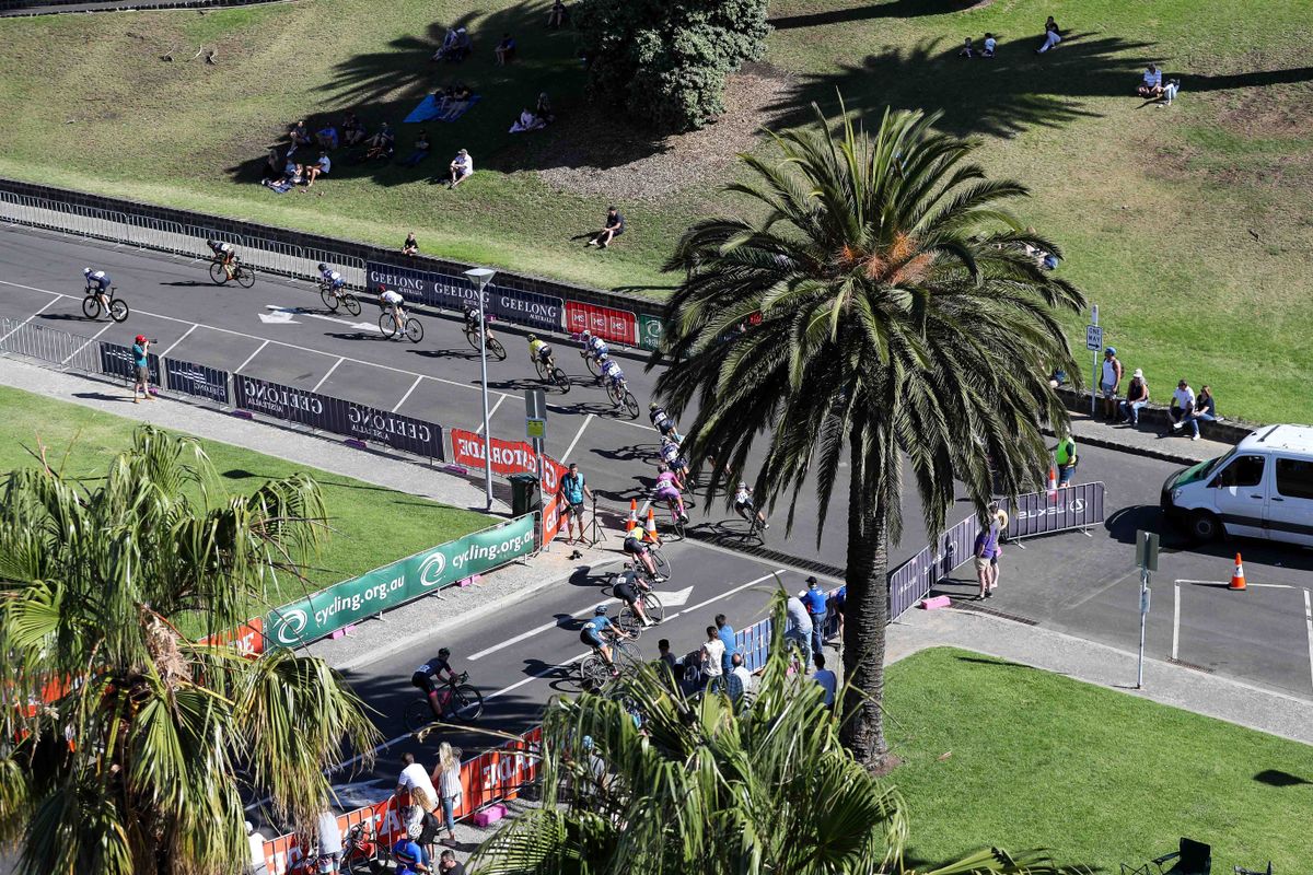 The peloton rounds a corner
