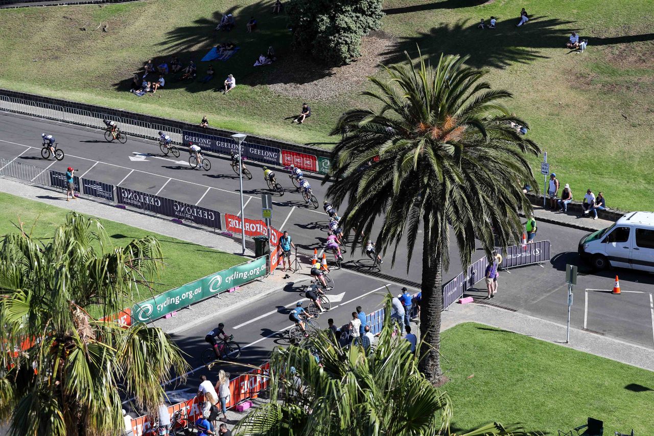 The peloton rounds a corner