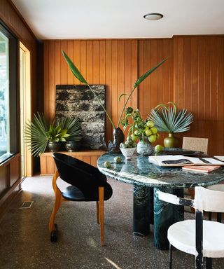 Mid century modern decor with wood panels and vintage furniture