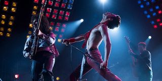 Rami Malek as Freddie Mercury singing We Will Rock You in Bohemian Rhapsody