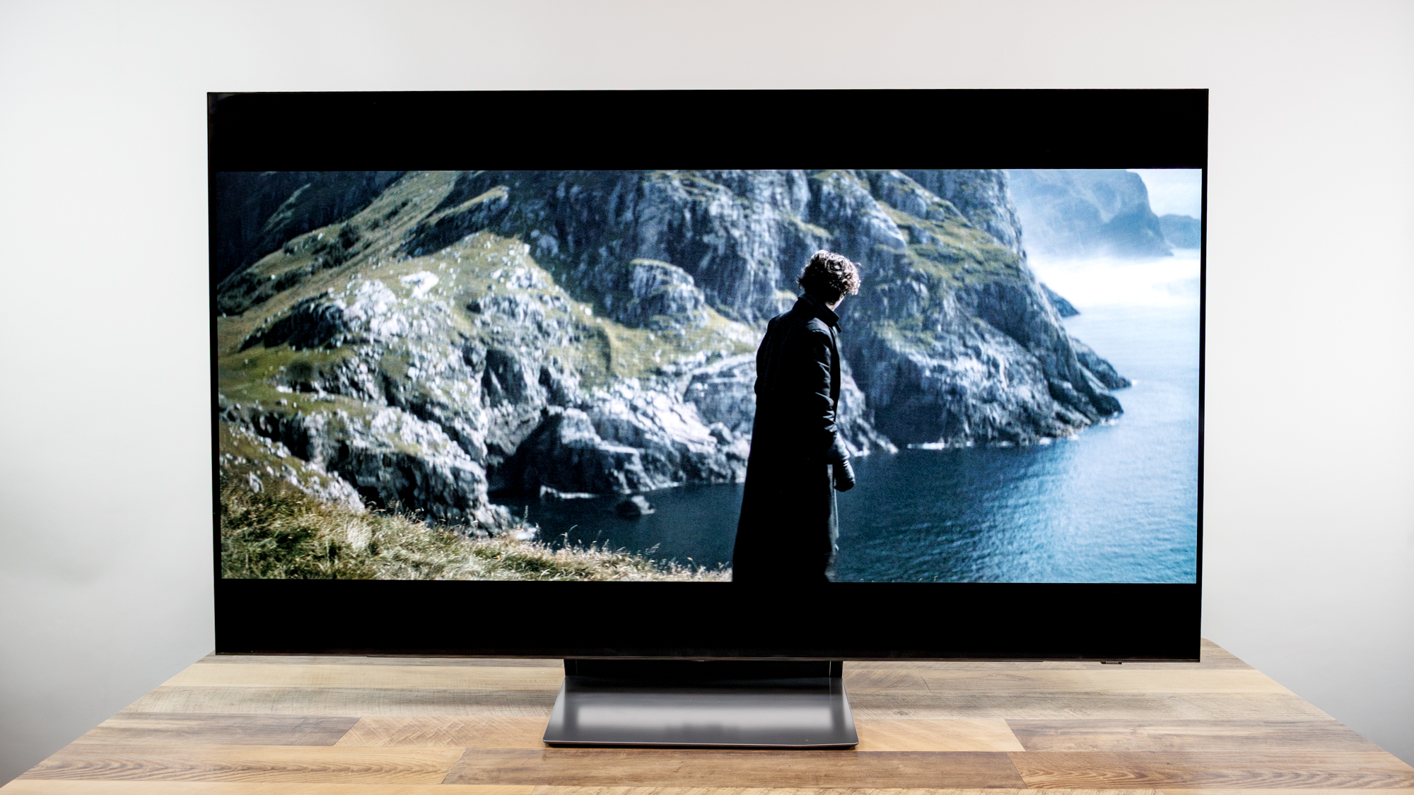 Samsung OLED S90H 4K TV on a desk