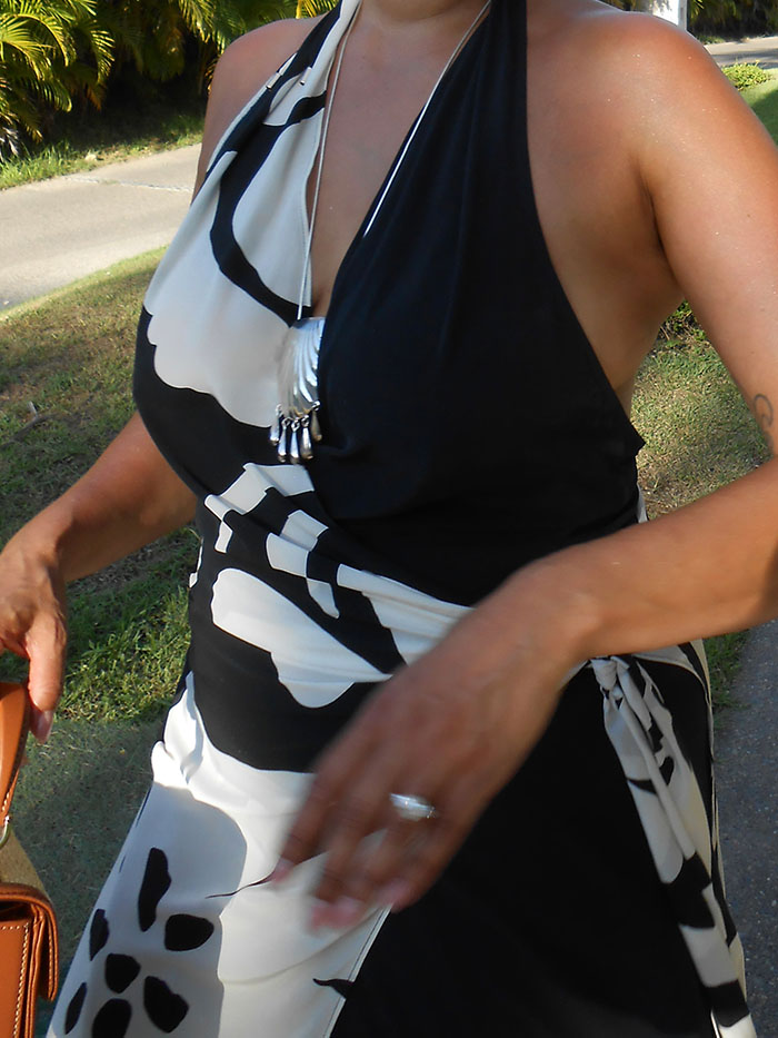 Jennifer Atilemile wearing a vacation outfit.