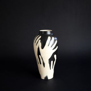 Vases with hands