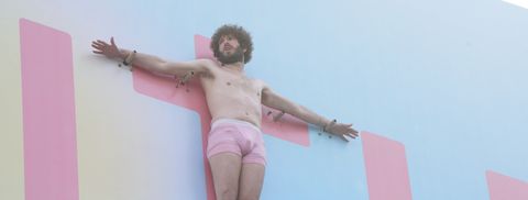 In 'Dave,' Lil Dicky (Dave Burd) helps advertise the arrival of his magnum opus 'Penith' by crucifying himself on a billboard in downtown Los Angeles.