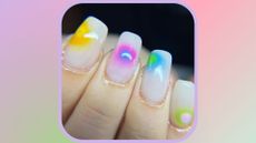 set of aura nails on a gradient background