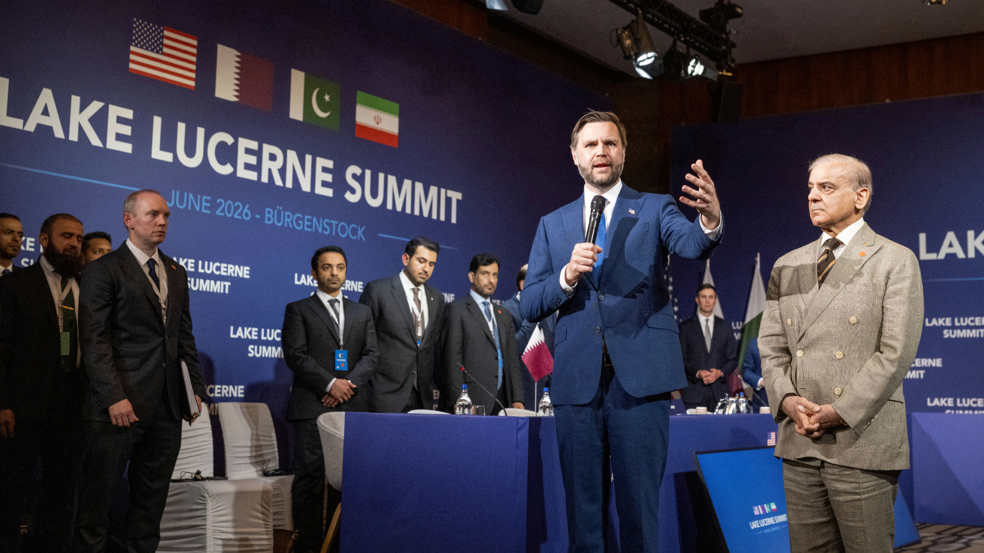 Vice President JD Vance speaks next to Pakistan's Prime Minister Shehbaz Sharif prior to a quadrilateral meeting between the United States, Iran, Pakistan and Qatar in Switzerland