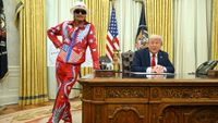 US President Donald Trump signs an executive order alongside US singer Kid Rock in the Oval Office of the White House in Washington, DC, on March 31, 2025. 