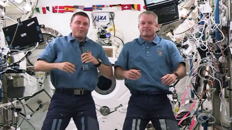 NASA astronauts Reid Wiseman and Steve Swanson talk to students from Elliot Ranch Elementary School in Elk Grove, California, from their home on the International Space Station during the last week of August 2014. The Americans are two of six spaceflyers 